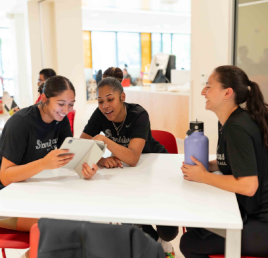 Students sitting on the first floor of the library