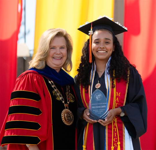 President Britt Rios-Ellis and Paola Campos