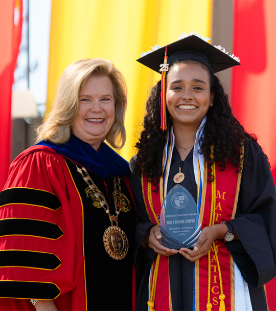 President Britt Rios-Ellis and Paola Campos
