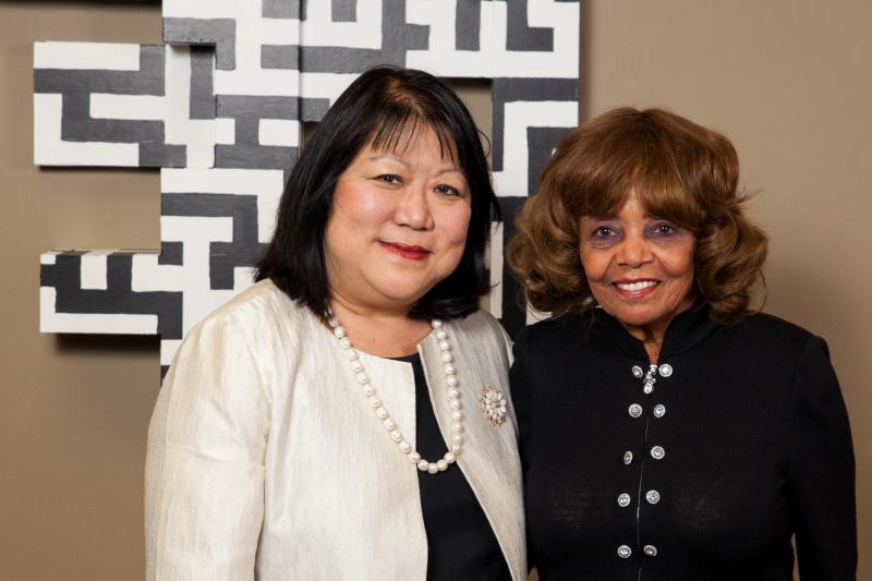 President Ellen Junn and Dr. Marvalene Hughes smile