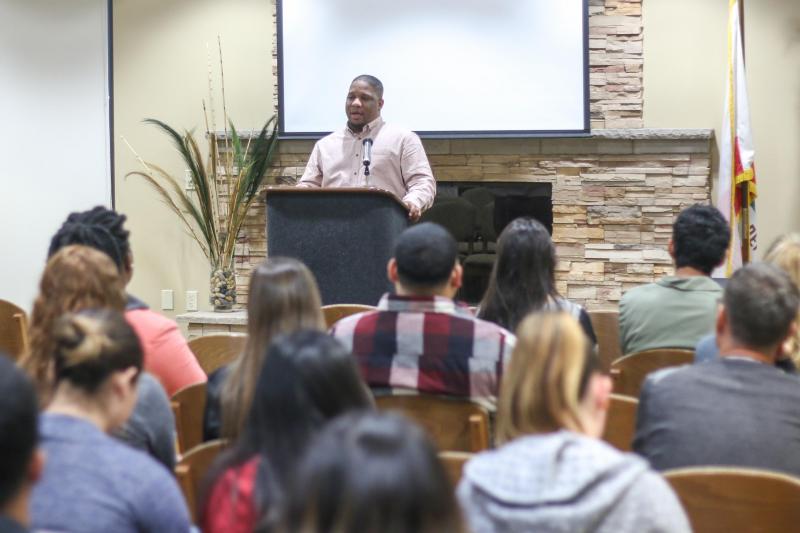 Baltimore social justice activist Dayvon Love speaks to afternoon crowd of students